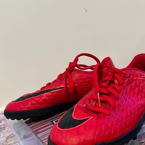 Red Nike soccer cleat’s